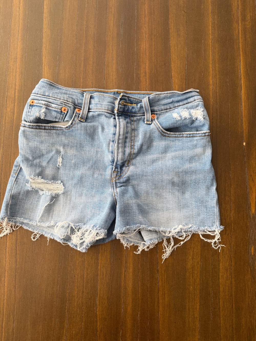 Levi’s Light Wash Distressed Denim Cutoff Shorts